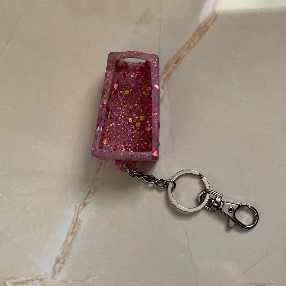 Hand sanitizer holder